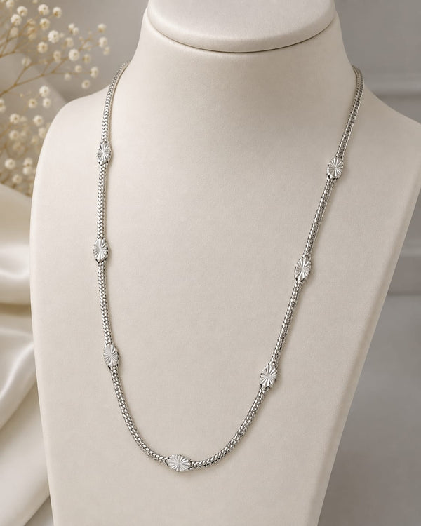 Silver textured link long chain necklace on jewellery display