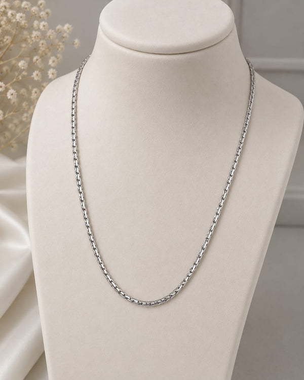 Silver minimalist classic chain necklace on white jewellery bust