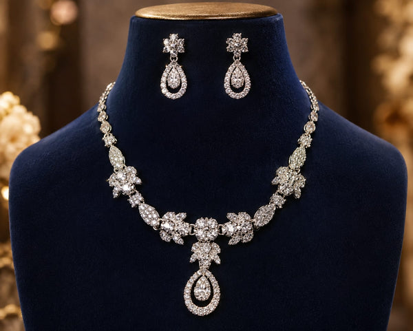 Silver floral crystal necklace and matching earrings set
