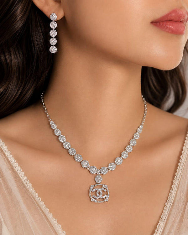 Silver crystal round pendant necklace and earring jewellery set